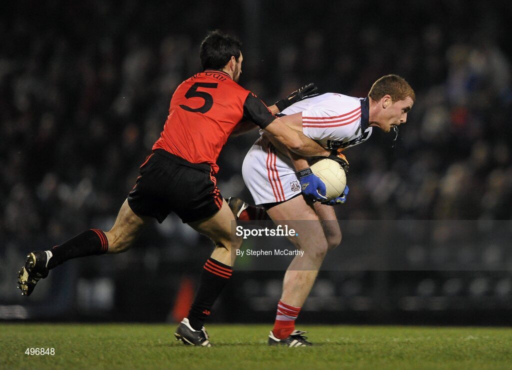 12 March 2011; Fintan Goold, Cork, in action against Aidan Branagan, Down. Allianz Football League, Division 1, Round 4, Cork v Down, Pairc Ui Rinn, Cork. Picture credit: Stephen McCarthy / SPORTSFILE