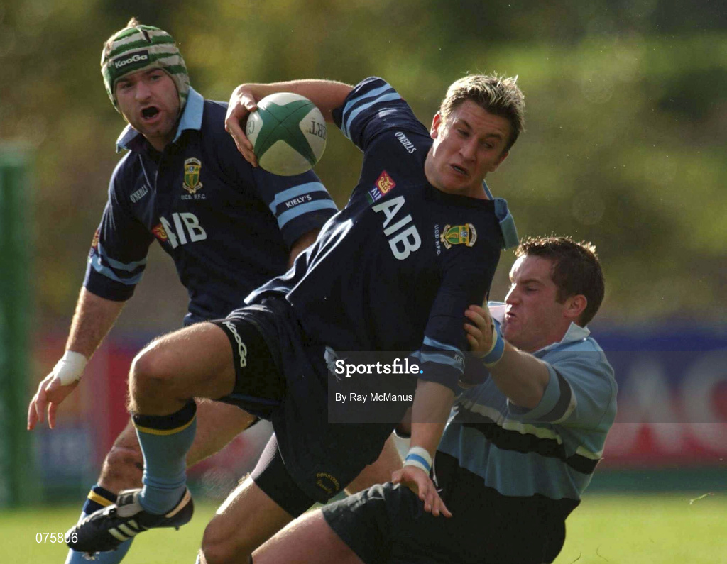 27 October 2001; Brian O'Riordan of UCD supported by Shane Moore, is tackled by Andy Kershaw of Galwegians during the AIB League Division 1 match between UCD and Galwegians at Belfield Bowl in Dublin. Photo by Ray McManus/Sportsfile