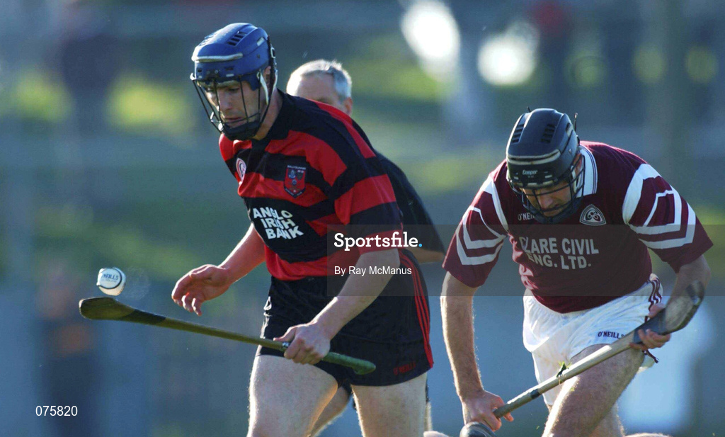 28 October 2001; Andy Moloney of Ballygunner races clear of Sean McMahon of St Joseph's Doora Barefield during the AIB Munster Senior Club Hurling Championship Quarter-Final match between Ballygunner and St Joseph's Doora Barefield at Walsh Park in Waterford. Photo by Ray McManus/Sportsfile