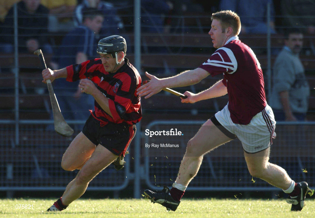 28 October 2001; Billy O'Sullivan of Ballygunner, races past Fergal O'Sullivan of St Joseph's Doora Barefield during the AIB Munster Senior Club Hurling Championship Quarter-Final match between Ballygunner and St Joseph's Doora Barefield at Walsh Park in Waterford. Photo by Ray McManus/Sportsfile