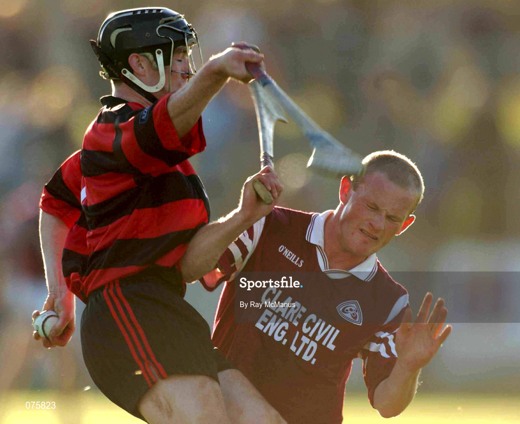 28 October 2001; Billy O'Sullivan of Ballygunner, is tackled by Dara O'Driscoll of St Joseph's Doora Barefield during the AIB Munster Senior Club Hurling Championship Quarter-Final match between Ballygunner and St Joseph's Doora Barefield at Walsh Park in Waterford. Photo by Ray McManus/Sportsfile