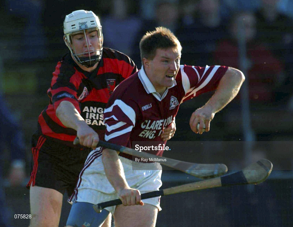 28 October 2001; James O'Connor of St Josephs Doora Barefield, is tackled by Alan Kirwan of Ballygunner, during the AIB Munster Senior Club Hurling Championship Quarter-Final match between Ballygunner and St Joseph's Doora Barefield at Walsh Park in Waterford. Photo by Ray McManus/Sportsfile