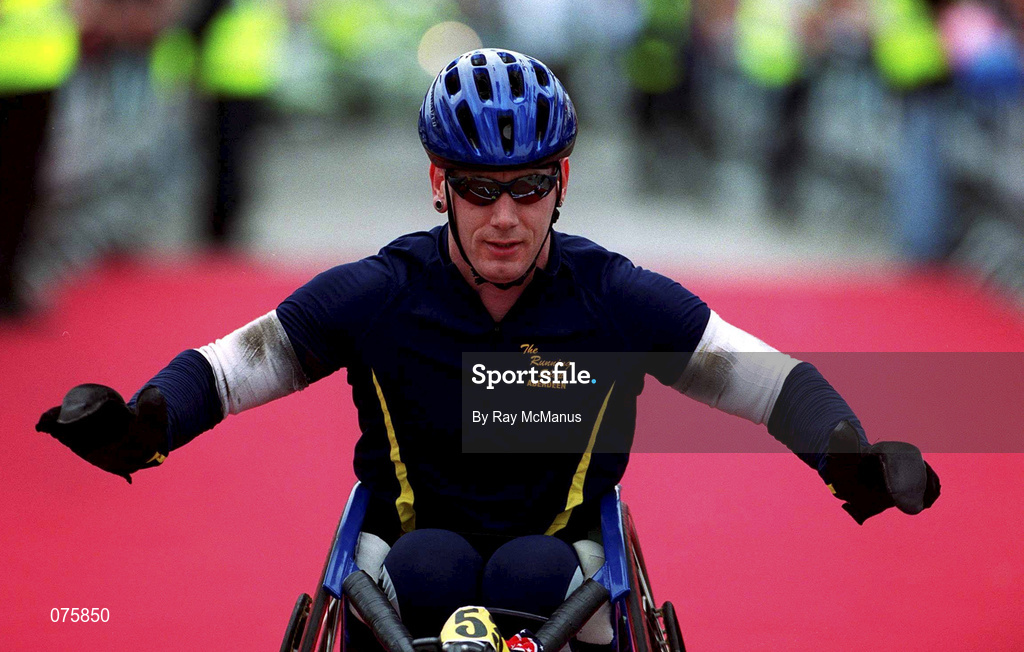 29 October 2001; Kenny Herriot, Scotland, crosses the finish line to win the wheelchair event of the adidas Dublin Marathon 2001. Photo by Ray McManus/Sportsfile
