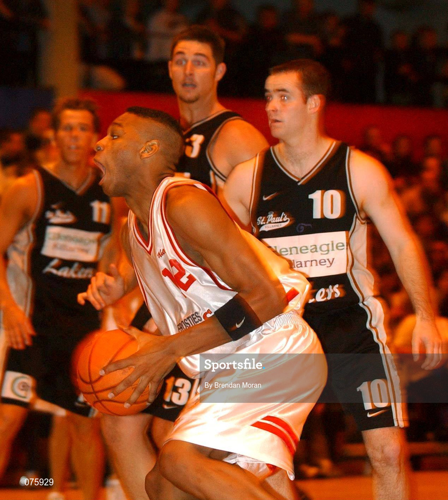 27 October 2001; Jermaine Turner of Frosties Tigers in action against Shane Horgan of Gleneagle Killarney during the ESB Men's Superleague Basketball match between Gleneagle Killarney and Frosties Tigers at Tralee Sports Centre in Tralee, Kerry. Photo by Brendan Moran/Sportsfile