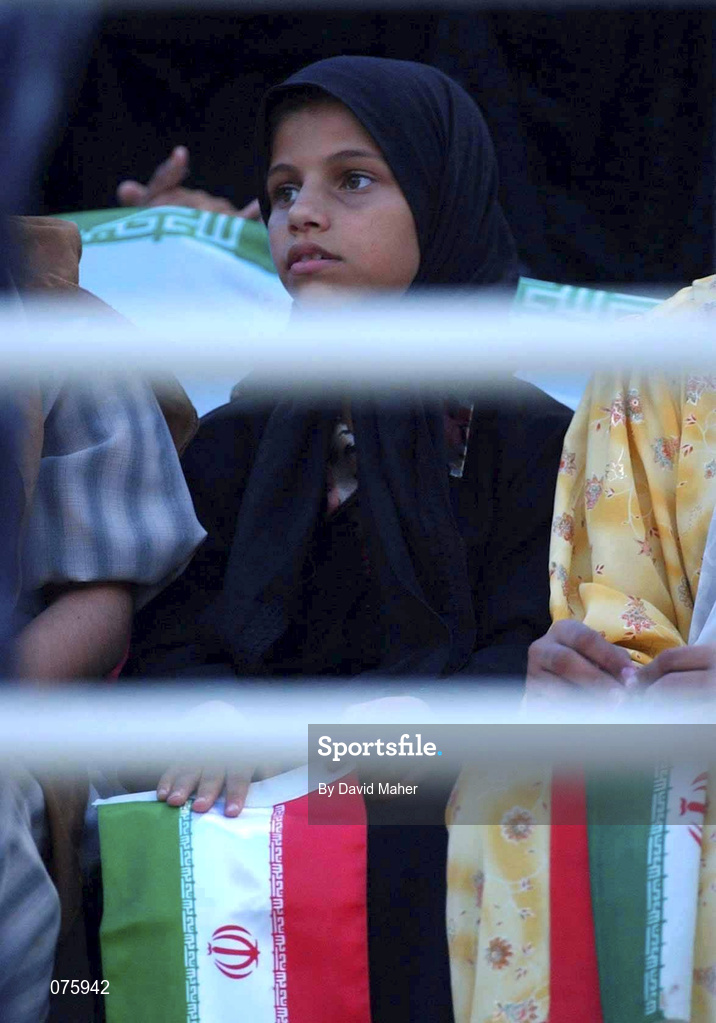 31 October 2001; A young Iranian fan watches from the stands during the 2002 FIFA World Cup AFC Qualification Play-Off 2nd Leg match between United Arab Emirates and Iran the at Al-Nahyan Stadium in Abu Dhabi, United Arab Emirates. Photo by David Maher/Sportsfile