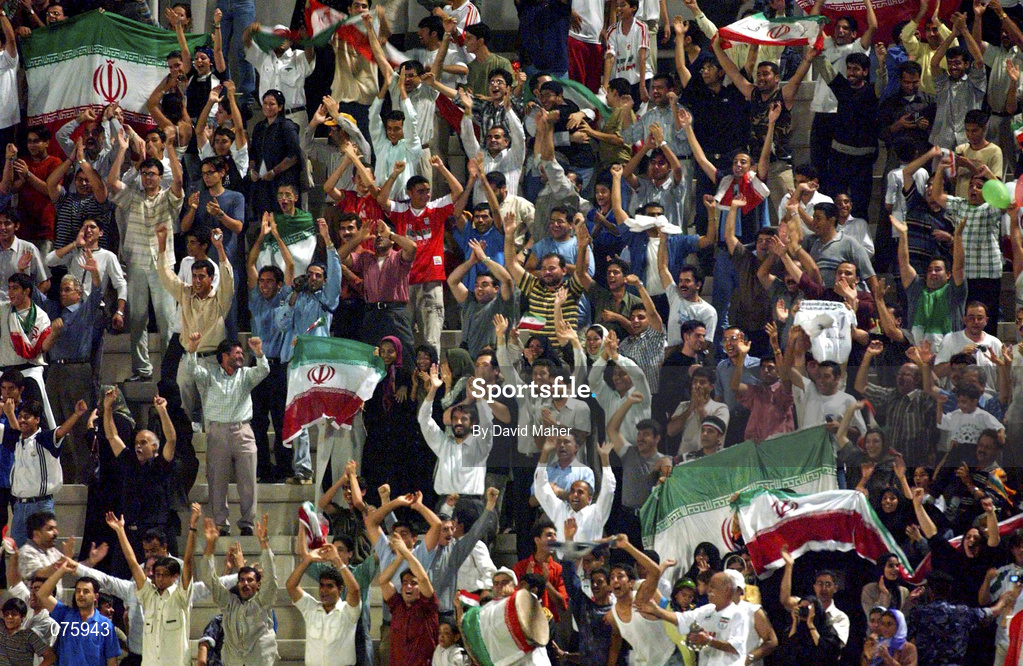 31 October 2001; Iranian supporters celebrate at the end of the game following their victory over the United Arab Emirates in the 2002 FIFA World Cup AFC Qualification Play-Off 2nd Leg match between United Arab Emirates and Iran the at Al-Nahyan Stadium in Abu Dhabi, United Arab Emirates. Photo by David Maher/Sportsfile
