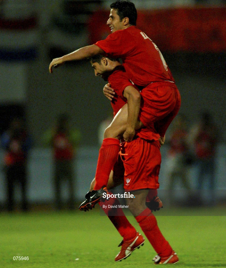 31 October 2001; Mehrdad Minavand and Hamed Kavianpour, top, both of Iran, celebrate victory over the United Arab Emirate in the 2002 FIFA World Cup AFC Qualification Play-Off 2nd Leg match between United Arab Emirates and Iran the at Al-Nahyan Stadium in Abu Dhabi, United Arab Emirates. Photo by David Maher/Sportsfile
