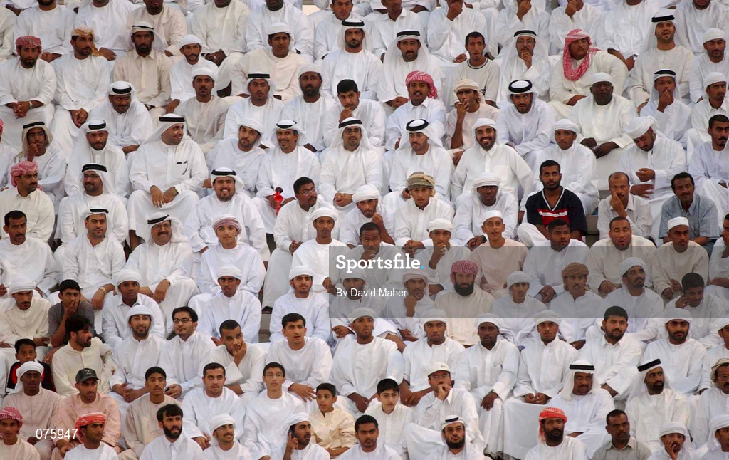 31 October 2001; United Arab Emirates supporters watch the game from the stands during the 2002 FIFA World Cup AFC Qualification Play-Off 2nd Leg match between United Arab Emirates and Iran the at Al-Nahyan Stadium in Abu Dhabi, United Arab Emirates. Photo by David Maher/Sportsfile