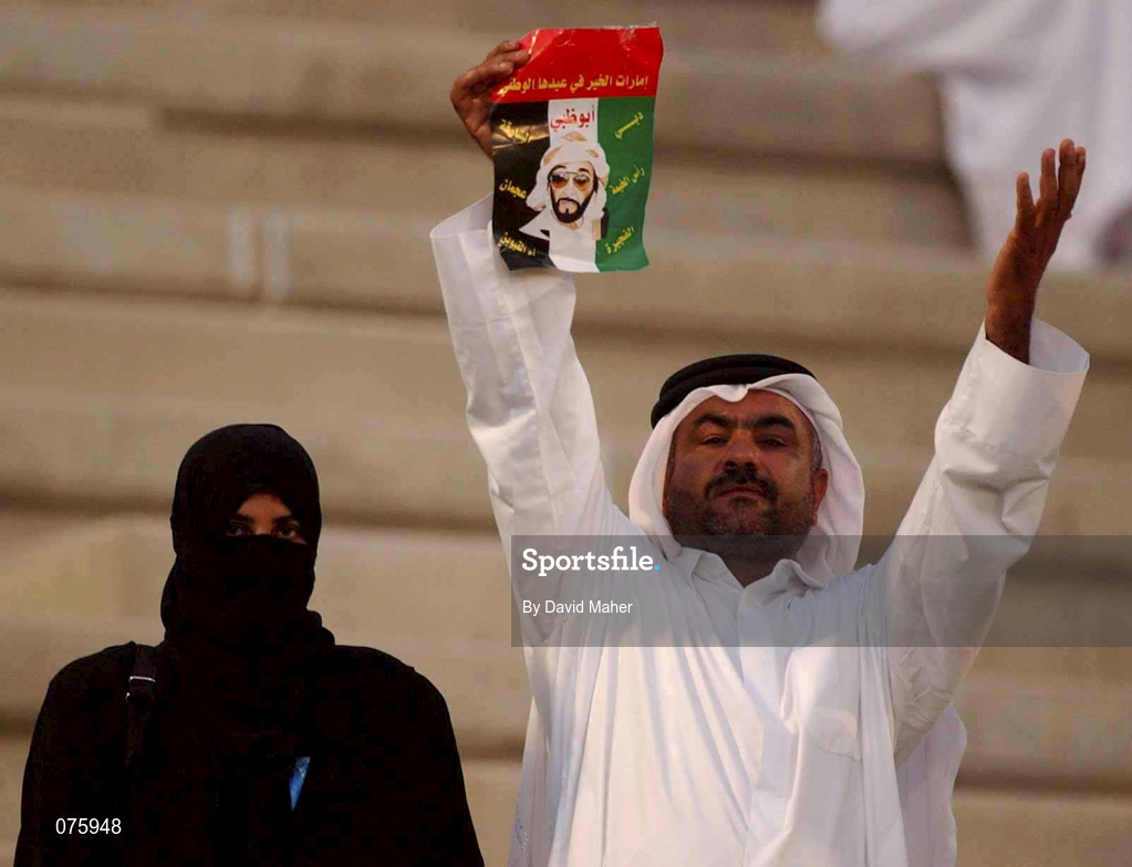 31 October 2001; A United Arab Emirates supporter shows his support for his team along with his wife ahead of the 2002 FIFA World Cup AFC Qualification Play-Off 2nd Leg match between United Arab Emirates and Iran the at Al-Nahyan Stadium in Abu Dhabi, United Arab Emirates. Photo by David Maher/Sportsfile