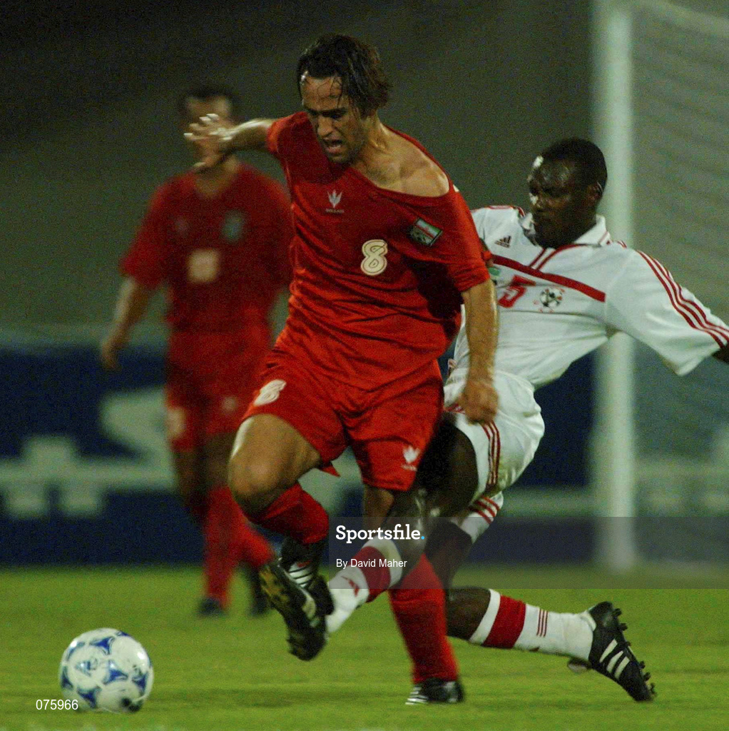 31 October 2001; Ali Karimi of Iran in action against Fahed Masoud Ali Masound of United Arab Emirates during the 2002 FIFA World Cup AFC Qualification Play-Off 2nd Leg match between United Arab Emirates and Iran the at Al-Nahyan Stadium in Abu Dhabi, United Arab Emirates. Photo by David Maher/Sportsfile