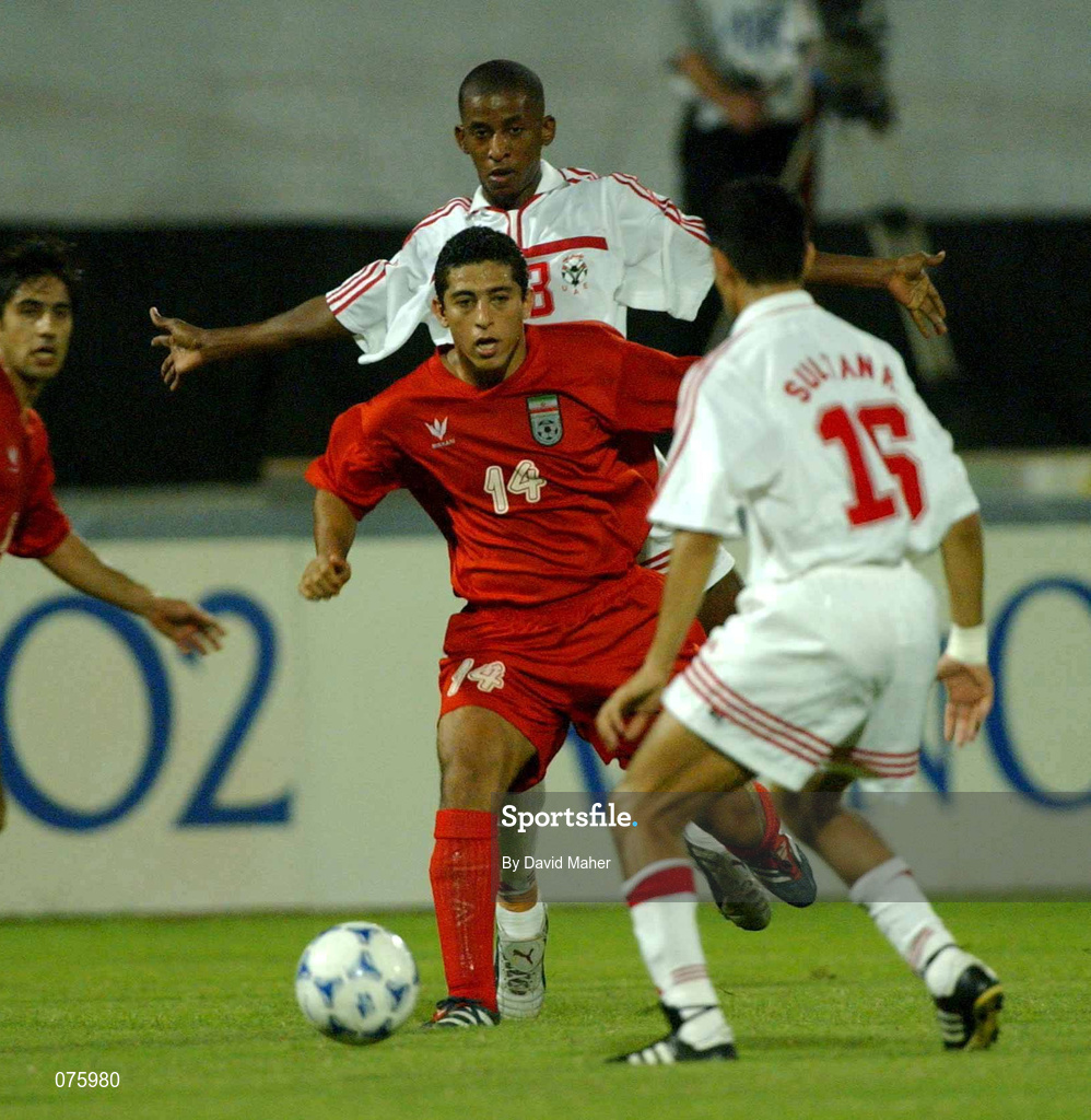 31 October 2001; Mujahed Khaziravi of Iran in action against Mohammed Qassim Juma of United Arab Emirates during the 2002 FIFA World Cup AFC Qualification Play-Off 2nd Leg match between United Arab Emirates and Iran the at Al-Nahyan Stadium in Abu Dhabi, United Arab Emirates. Photo by David Maher/Sportsfile
