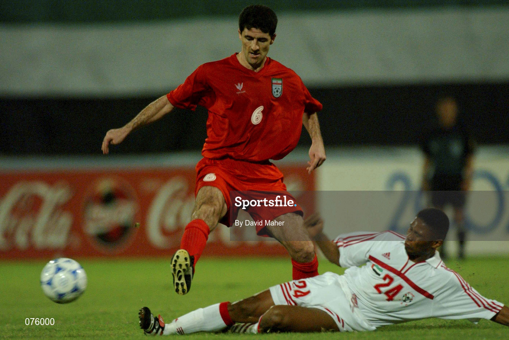 31 October 2001; Kharim Bagheri of Iran in action against Sibait Khater Fayel of United Arab Emirates during the 2002 FIFA World Cup AFC Qualification Play-Off 2nd Leg match between United Arab Emirates and Iran the at Al-Nahyan Stadium in Abu Dhabi, United Arab Emirates. Photo by David Maher/Sportsfile