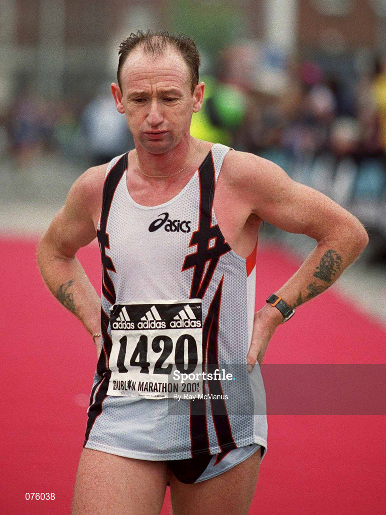 29 October 2001; Ireland's Martin Taylor after crossing the finishing line at the adidas Dublin Marathon in Dublin. Photo by Ray McManus/Sportsfile