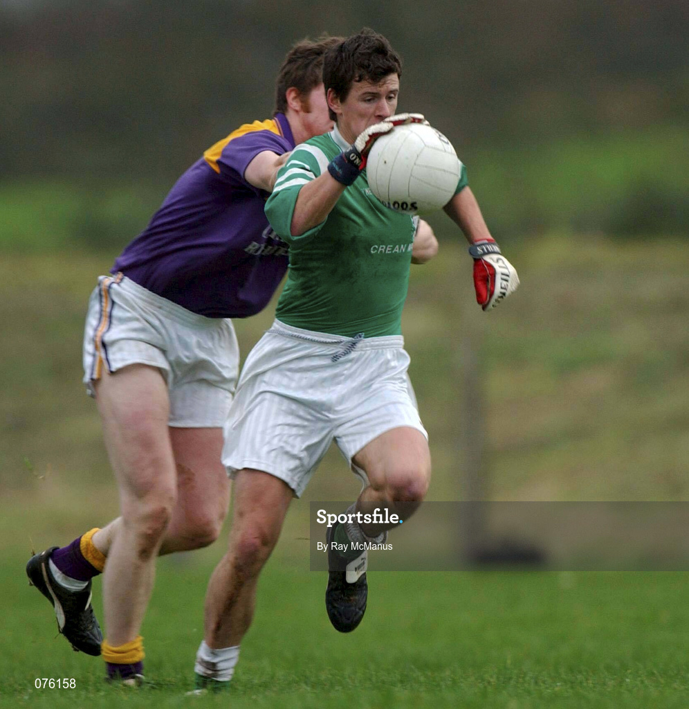 4 November 2001; Aidan Higgins of Charlestown Sarsfields in action against Alan Nolan of  Roscommon Gaels during the AIB Connacht Club Senior Football Championship Semi-final match between Charlestown Sarsfields and Roscommon Gaels at Fr O'Hara Memorial Park in Charlestown, Mayo. Photo by Ray McManus/Sportsfile