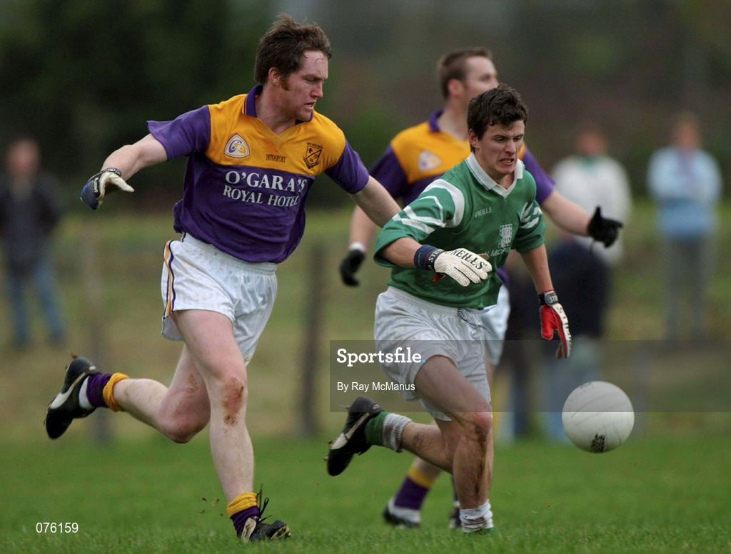 4 November 2001; Aidan Higgins of Charlestown Sarsfields in action against Alan Nolan of Roscommon Gaels during the AIB Connacht Club Senior Football Championship Semi-final match between Charlestown Sarsfields and Roscommon Gaels at Fr O'Hara Memorial Park in Charlestown, Mayo. Photo by Ray McManus/Sportsfile