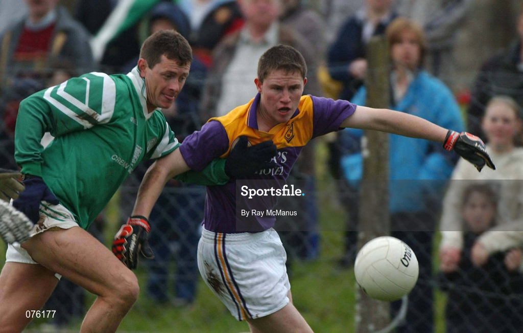 4 November 2001; Sean Higgins of Charlestown Sarsfields in action against John Nolan of Roscommon Gaels during the AIB Connacht Club Senior Football Championship Semi-final match between Charlestown Sarsfields and Roscommon Gaels at Fr O'Hara Memorial Park in Charlestown, Mayo. Photo by Ray McManus/Sportsfile