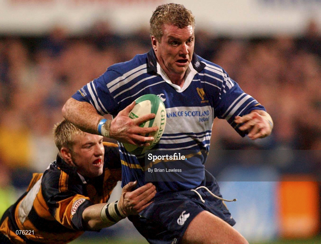 26 October 2001; Victor Costello of Leinster is tackled by Andrew Powell of Newport during the Heineken Cup Pool 6 Round 3 match between Leinster and Newport at Donnybrook Stadium in Dublin. Photo by Brian Lawless/Sportsfile