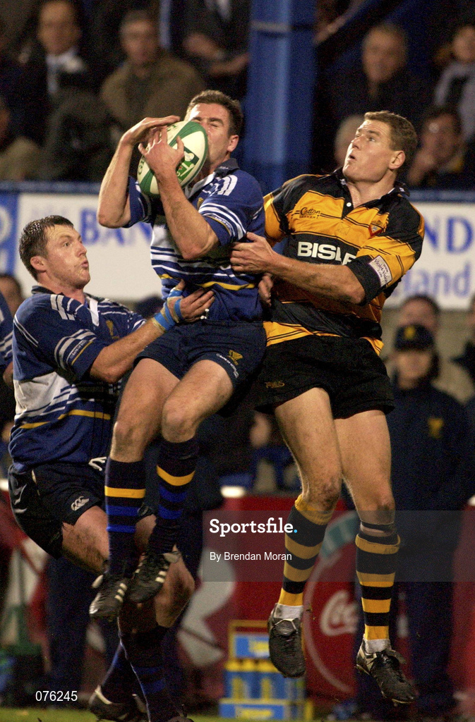 26 October 2001; Peter McKenna of Leinster fields a high ball while being tackled by Matt Mostyn of Newport during the Heineken Cup Pool 6 Round 3 match between Leinster and Newport at Donnybrook Stadium in Dublin. Photo by Brendan Moran/Sportsfile