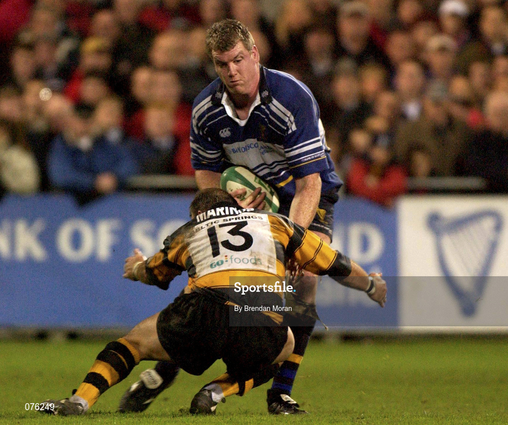 26 October 2001; Victor Costello of Leinster is tackled by Andy Marinos of Newport during the Heineken Cup Pool 6 Round 3 match between Leinster and Newport at Donnybrook Stadium in Dublin. Photo by Brendan Moran/Sportsfile
