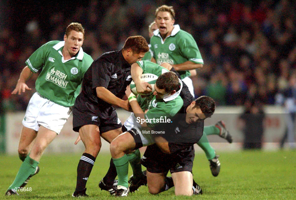 13 November 2001; Jason Holland of Ireland, is tackled by Pita Alatini, left, and David Hill, both of New Zealand during the "A" International Rugby Friendly match between Ireland and New Zealand at Ravenhill Stadium in Belfast. Photo by Matt Browne/Sportsfile