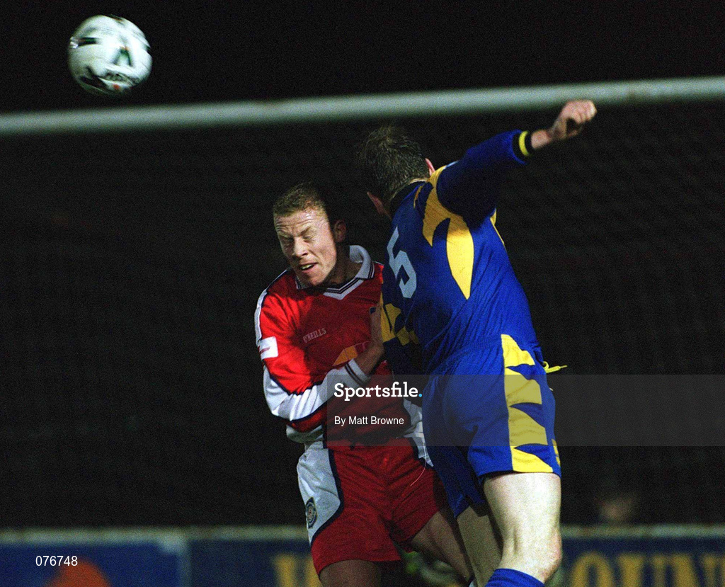 23 March 2001; Stephen McGuinness of St Patrick's Athletic in action against Eric Smith of Longford Town during the FAI Harp Lager Cup Third Round Replay match between St Patrick's Athletic and Longford Town at Richmond Park in Dublin. Photo by Matt Browne/Sportsfile