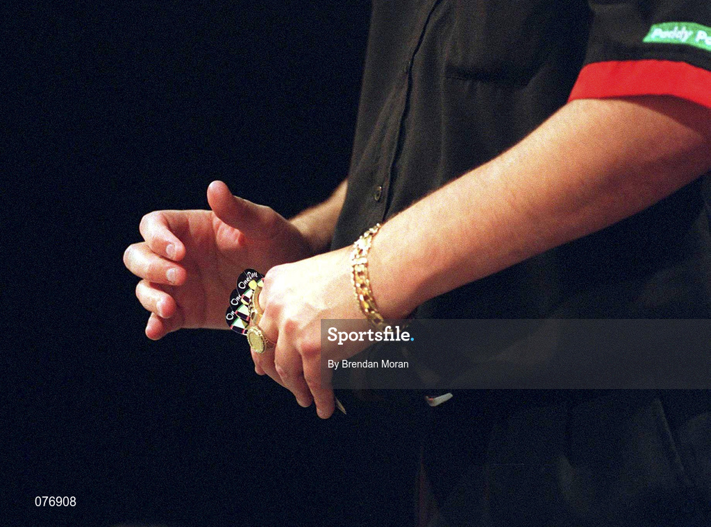 24 October 2001; A darts player pictured during the Paddy Power / Professional Darts Corporation World Grand Prix Darts Championship at Citywest Hotel in Saggart, Dublin. Photo by Brendan Moran/Sportsfile