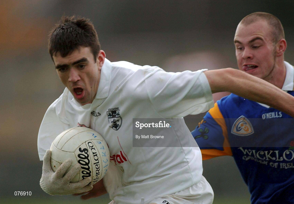 18 November 2001; John Doyle of Kildare is tackled by Adrian Foley of Wicklow during the O'Byrne Cup Group 2 match between Wicklow and Kildare at the County Grounds in Aughrim, Wicklow. Photo by Matt Browne/Sportsfile