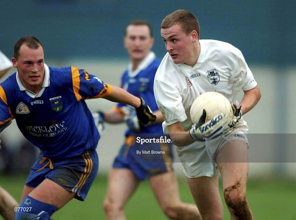 18 November 2001; Padraig Mullarkey of Kildare is tackled by Brendan Hannaidh of Wicklow during the O'Byrne Cup Group 2 match between Wicklow and Kildare at the County Grounds in Aughrim, Wicklow. Photo by Matt Browne/Sportsfile