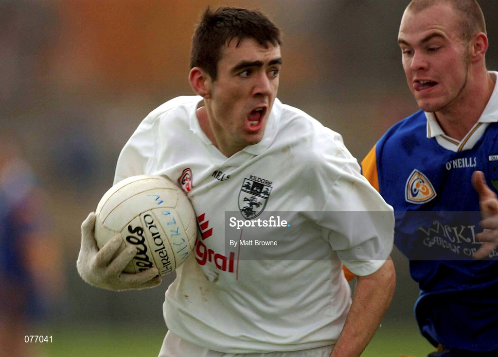 18 November 2001; John Doyle of Kildare is tackled by Adrian Foley of Wicklow during the O'Byrne Cup Group 2 match between Wicklow and Kildare at the County Grounds in Aughrim, Wicklow. Photo by Matt Browne/Sportsfile