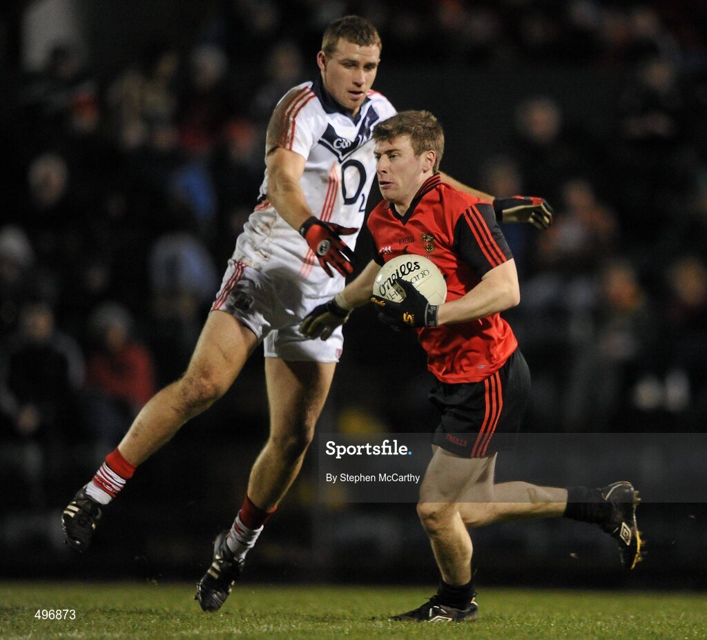 12 March 2011; Luke Howard, Down, in action against Ciaran Sheehan, Cork. Allianz Football League, Division 1, Round 4, Cork v Down, Pairc Ui Rinn, Cork. Picture credit: Stephen McCarthy / SPORTSFILE