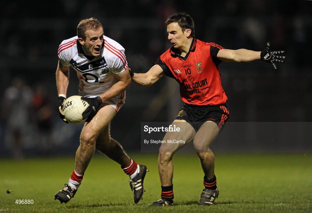 12 March 2011; Paudie kissane, Cork, in action against Danny Hughes, Down. Allianz Football League, Division 1, Round 4, Cork v Down, Pairc Ui Rinn, Cork. Picture credit: Stephen McCarthy / SPORTSFILE