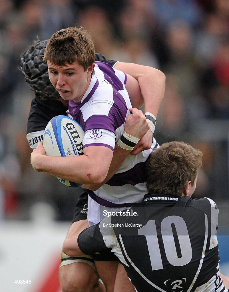 17 March 2011; David Quirke, Clongowes Wood College SJ, is tackled by Rory Maloney, left, and Bill Duggan, Cistercian College Roscrea. Powerade Leinster Schools Senior Cup Final, Cistercian College Roscrea v Clongowes Wood College SJ, RDS, Ballsbridge, Dublin. Picture credit: Stephen McCarthy / SPORTSFILE