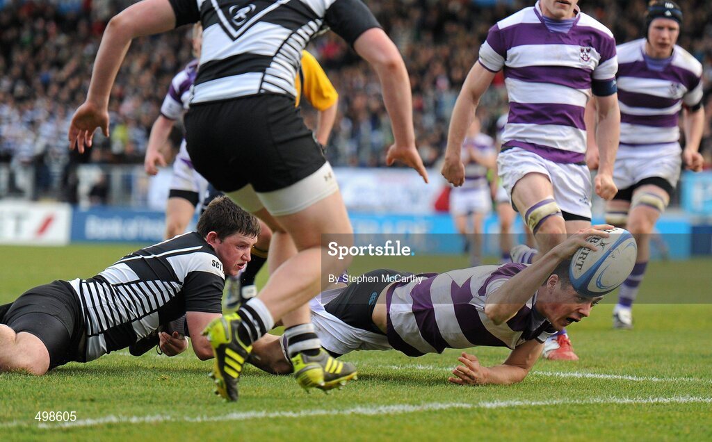 17 March 2011; Jordan Coghlan, Clongowes Wood College SJ, goes over for a try despite the tackle of Eamonn Quirke, Cistercian College Roscrea. Powerade Leinster Schools Senior Cup Final, Cistercian College Roscrea v Clongowes Wood College SJ, RDS, Ballsbridge, Dublin. Picture credit: Stephen McCarthy / SPORTSFILE