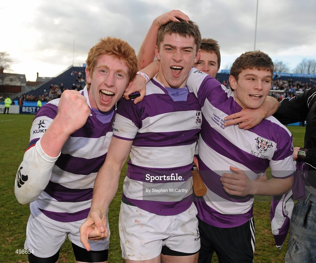 17 March 2011; Clongowes Wood College SJ players, from left, Harry Burns, Nick McMcCarthy and former player Oscar O'Sulleabhain celebrate their side's victory. Powerade Leinster Schools Senior Cup Final, Cistercian College Roscrea v Clongowes Wood College SJ, RDS, Ballsbridge, Dublin. Picture credit: Stephen McCarthy / SPORTSFILE