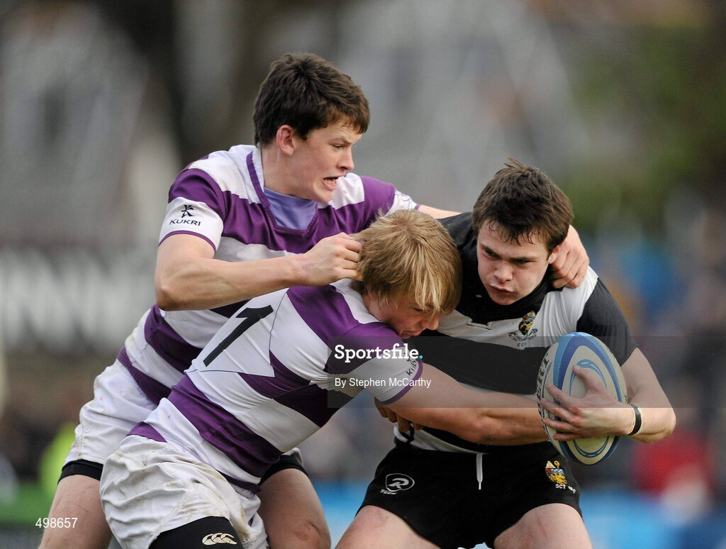 17 March 2011; Shane Layden, Cistercian College Roscrea, is tackled by Conor Joyce, left, and Sebastien Fromm, Clongowes Wood College SJ. Powerade Leinster Schools Senior Cup Final, Cistercian College Roscrea v Clongowes Wood College SJ, RDS, Ballsbridge, Dublin. Picture credit: Stephen McCarthy / SPORTSFILE