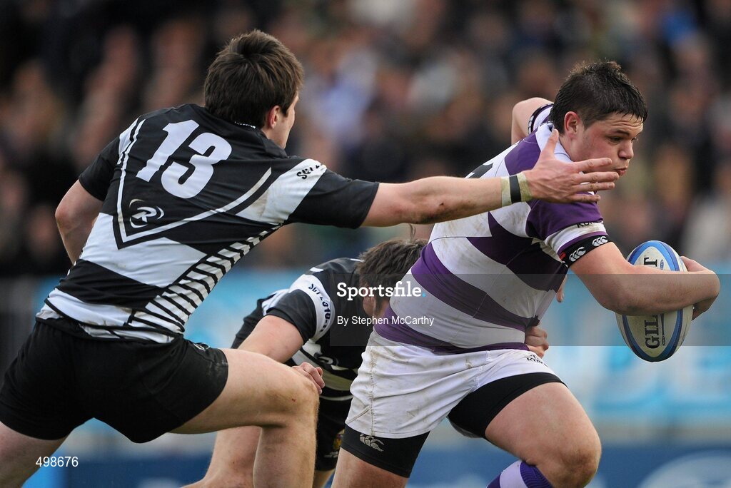 17 March 2011; Gordon Frayne, Clongowes Wood College SJ, is tackled by Conor Finn and Shane Layden, left, Cistercian College Roscrea. Powerade Leinster Schools Senior Cup Final, Cistercian College Roscrea v Clongowes Wood College SJ, RDS, Ballsbridge, Dublin. Picture credit: Stephen McCarthy / SPORTSFILE