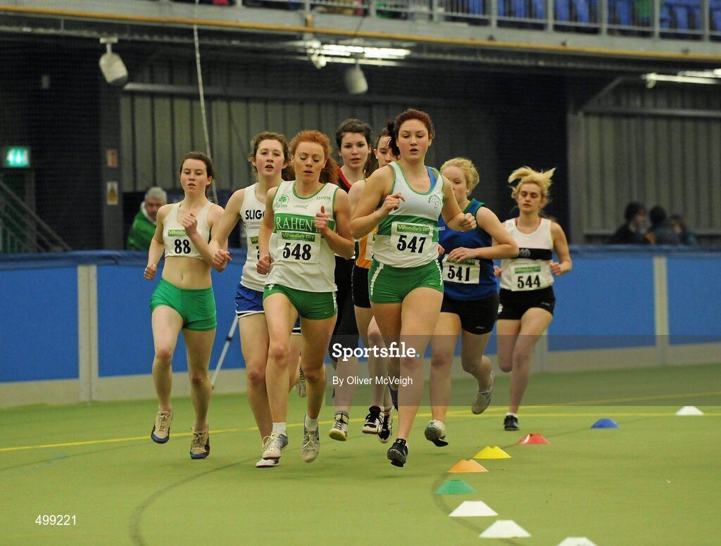 19 March 2011; Isseult O'Donnell, 548, from Raheny Shamrock AC, Dublin, and Chloe Doran, 547, Raheny Shamrock AC, leading the U19 girls 1500m final. Woodie’s DIY National Juvenile Indoor Championships, Meadowbank Indoor Arena, Magherafelt, Derry. Picture credit: Oliver McVeigh / SPORTSFILE
