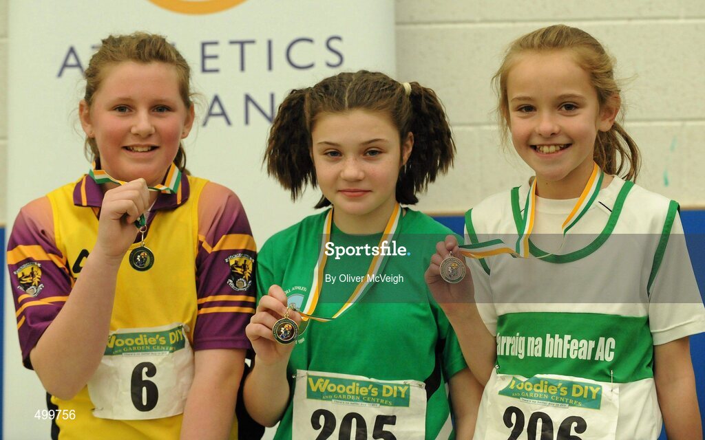 19 March 2011; Competitors, from left to right, Marguerite Furlong, Adamstown, 2nd place, Vickie Cusack, Liscarroll, 1st place, and Arianne O'Flynn, Carraig-Na-Bhfear, 3rd place, with their medals after the U12 Girls Shot Putt. Woodie’s DIY National Juvenile Indoor Championships, Meadowbank Indoor Arena, Magherafelt, Derry. Picture credit: Oliver McVeigh / SPORTSFILE