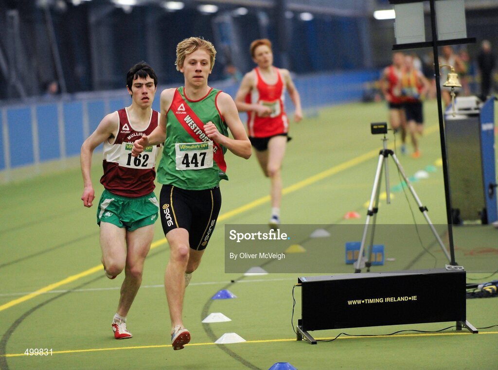 19 March 2011; David Harper, Wesport AC, Co. Mayo, takes the bell in front of Thomas Lynn, Mullingar Harriers, Co. Westmeath, during the U17 Boys 1500m. Woodie’s DIY National Juvenile Indoor Championships, Meadowbank Indoor Arena, Magherafelt, Derry. Picture credit: Oliver McVeigh / SPORTSFILE