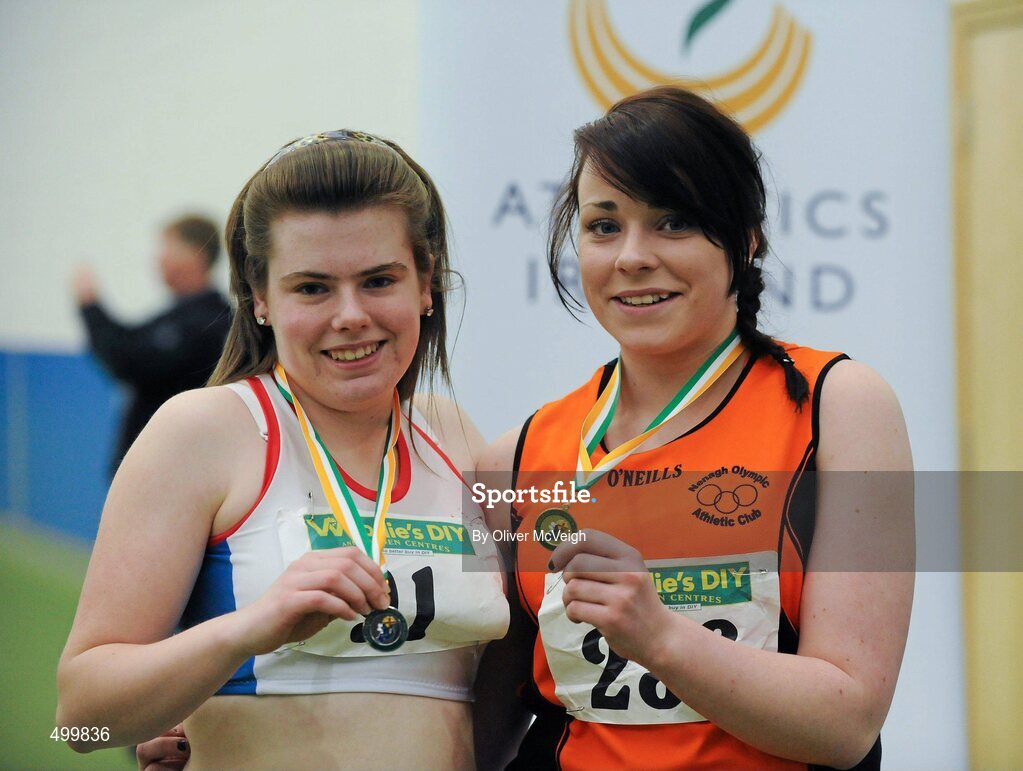 19 March 2011; U19 Girls Triple Jump winner Chloe Fahy, Nenagh Olympic, Co. Tipperary, right, with second place Catherina Corcoran, Bree AC, Co. Wexford. Woodie’s DIY National Juvenile Indoor Championships, Meadowbank Indoor Arena, Magherafelt, Derry. Picture credit: Oliver McVeigh / SPORTSFILE