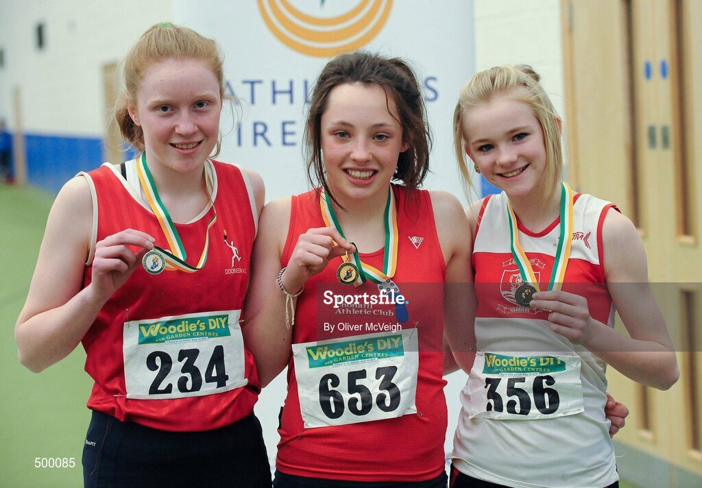19 March 2011; U15 Girls 60 Hurdles winner Kate McGowan, Tir Chonaill, Co. Donegal, centre, with second place Clodagh O'Mahony, Dooneen, Co. Limerick, left, and third place Laura Ann Costello, Galway City Harriers, Galway. Woodie’s DIY National Junior Indoor Championships, Meadowbank Indoor Arena, Magherafelt, Derry. Picture credit: Oliver McVeigh / SPORTSFILE