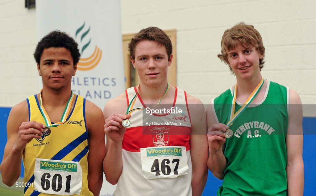 19 March 2011; U18 boys 60m hurdles winner Simon Callaghan, Galway City Harriers, centre, with second place Joshua Essuman, Dublin Striders, left, and third place John Power, Ferrybank, Co. Waterford. Woodie’s DIY National Junior Indoor Championships, Meadowbank Indoor Arena, Magherafelt, Derry. Picture credit: Oliver McVeigh / SPORTSFILE