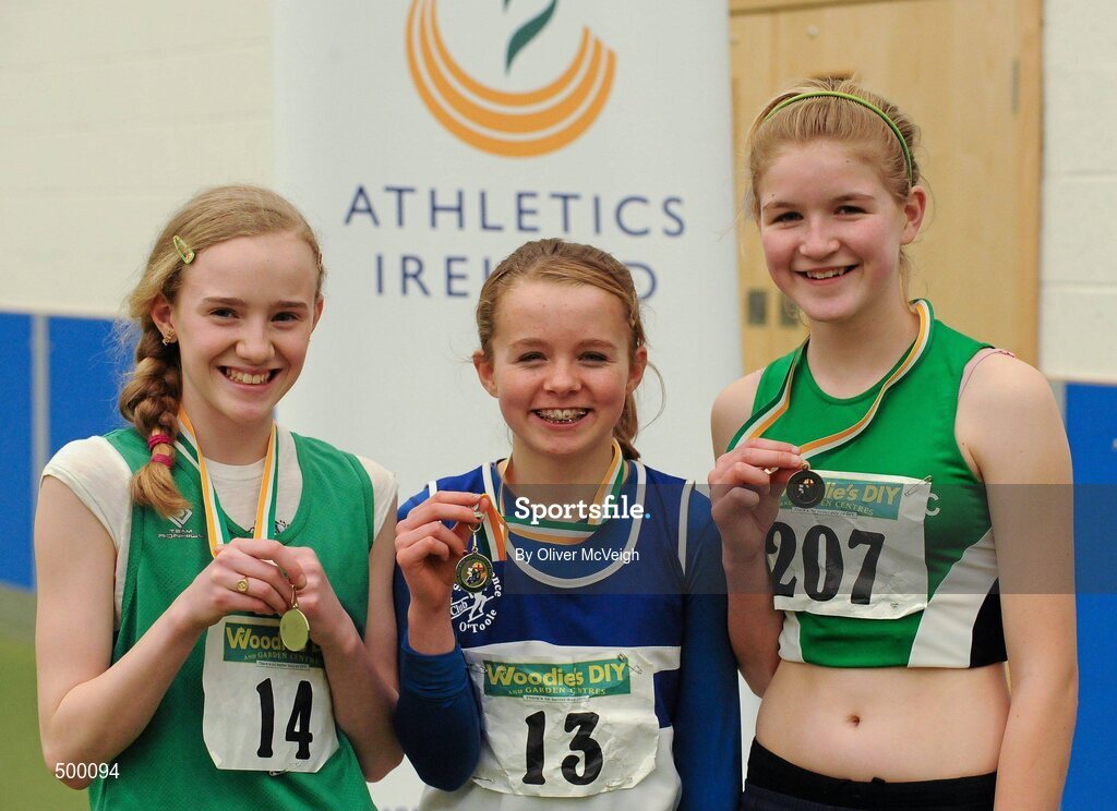 19 March 2011; U13 girls hurdles winner Molly Sweeney, St Lawerence O'Tooles, Co. Carlow, centre, with second place Shannon Sheehy, Cushinstown, Co. Meath, left, and third place Anne Corcoran, Ferrybank, Co. Waterford. Woodie’s DIY National Junior Indoor Championships, Meadowbank Indoor Arena, Magherafelt, Derry. Picture credit: Oliver McVeigh / SPORTSFILE