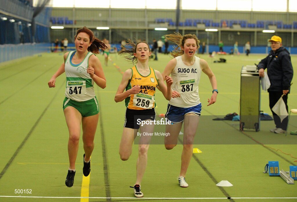 19 March 2011; Athletes, from left, Chloe Doran, Raheny Shamrock, Dublin, Harriet Flynn, Shannon, Co. Clare, and Sharon Hodgins, Sligo, in a close finish of the U19 girls 500m. Woodie’s DIY National Junior Indoor Championships, Meadowbank Indoor Arena, Magherafelt, Derry. Picture credit: Oliver McVeigh / SPORTSFILE