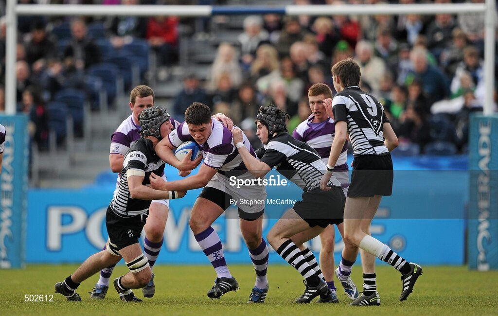 17 March 2011; Gordon Frayne, Clongowes Wood College SJ, is tackled by Rory Moloney, left, and Denis O'Dwyer, Cistercian College Roscrea. Powerade Leinster Schools Senior Cup Final, Cistercian College Roscrea v Clongowes Wood College SJ, RDS, Ballsbridge, Dublin. Picture credit: Stephen McCarthy / SPORTSFILE