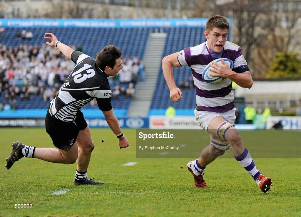17 March 2011; Nick McCarthy, Clongowes Wood College SJ, goes over for a try despite the attention of Aiden McGrath, Cistercian College Roscrea. Powerade Leinster Schools Senior Cup Final, Cistercian College Roscrea v Clongowes Wood College SJ, RDS, Ballsbridge, Dublin. Picture credit: Stephen McCarthy / SPORTSFILE
