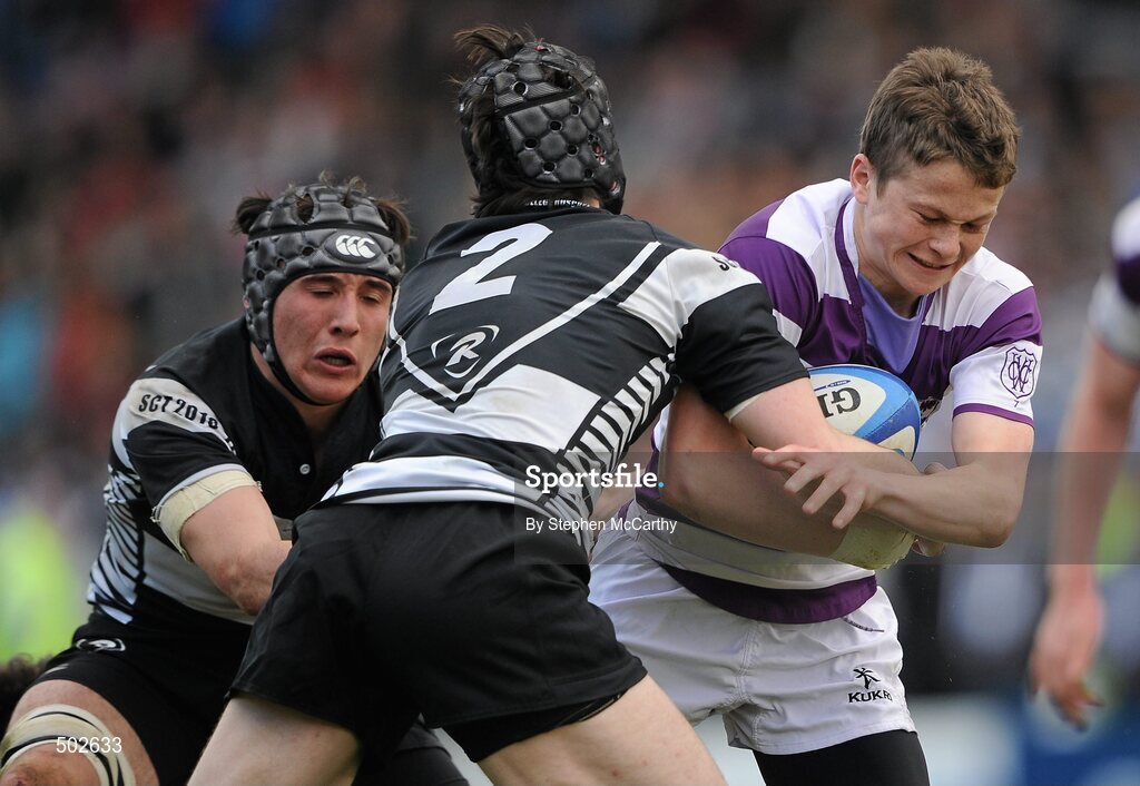 17 March 2011; Max McFarland, Clongowes Wood College SJ, is tackled by Denis O'Dwyer, 2, Cistercian College Roscrea. Powerade Leinster Schools Senior Cup Final, Cistercian College Roscrea v Clongowes Wood College SJ, RDS, Ballsbridge, Dublin. Picture credit: Stephen McCarthy / SPORTSFILE