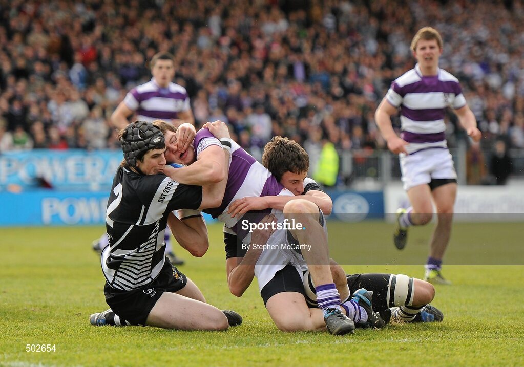 17 March 2011; Conor Joyce, Clongowes Wood College SJ, is tackled by Bryan Byrne, left, and Aidan McGrath, Cistercian College Roscrea. Powerade Leinster Schools Senior Cup Final, Cistercian College Roscrea v Clongowes Wood College SJ, RDS, Ballsbridge, Dublin. Picture credit: Stephen McCarthy / SPORTSFILE