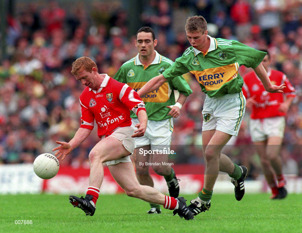 5 July 1998; Aidan Dorgan of Cork in action against Tomás Ó Sé of Kerry during the Bank of Ireland Munster Senior Football Championship Semi-Final match between Kerry and Cork at Fitzgerald Stadium in Killarney, Kerry. Photo by Brendan Moran/Sportsfile
