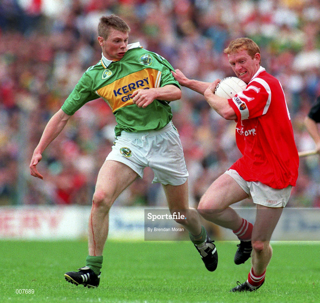 5 July 1998; Aidan Dorgan of Cork in action against Tomás O Sé of Kerry during the Bank of Ireland Munster Senior Football Championship Semi-Final match between Kerry and Cork at Fitzgerald Stadium in Killarney, Kerry. Photo by Brendan Moran/Sportsfile